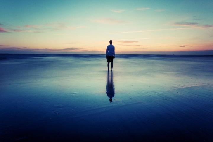 a sunset over a body of water